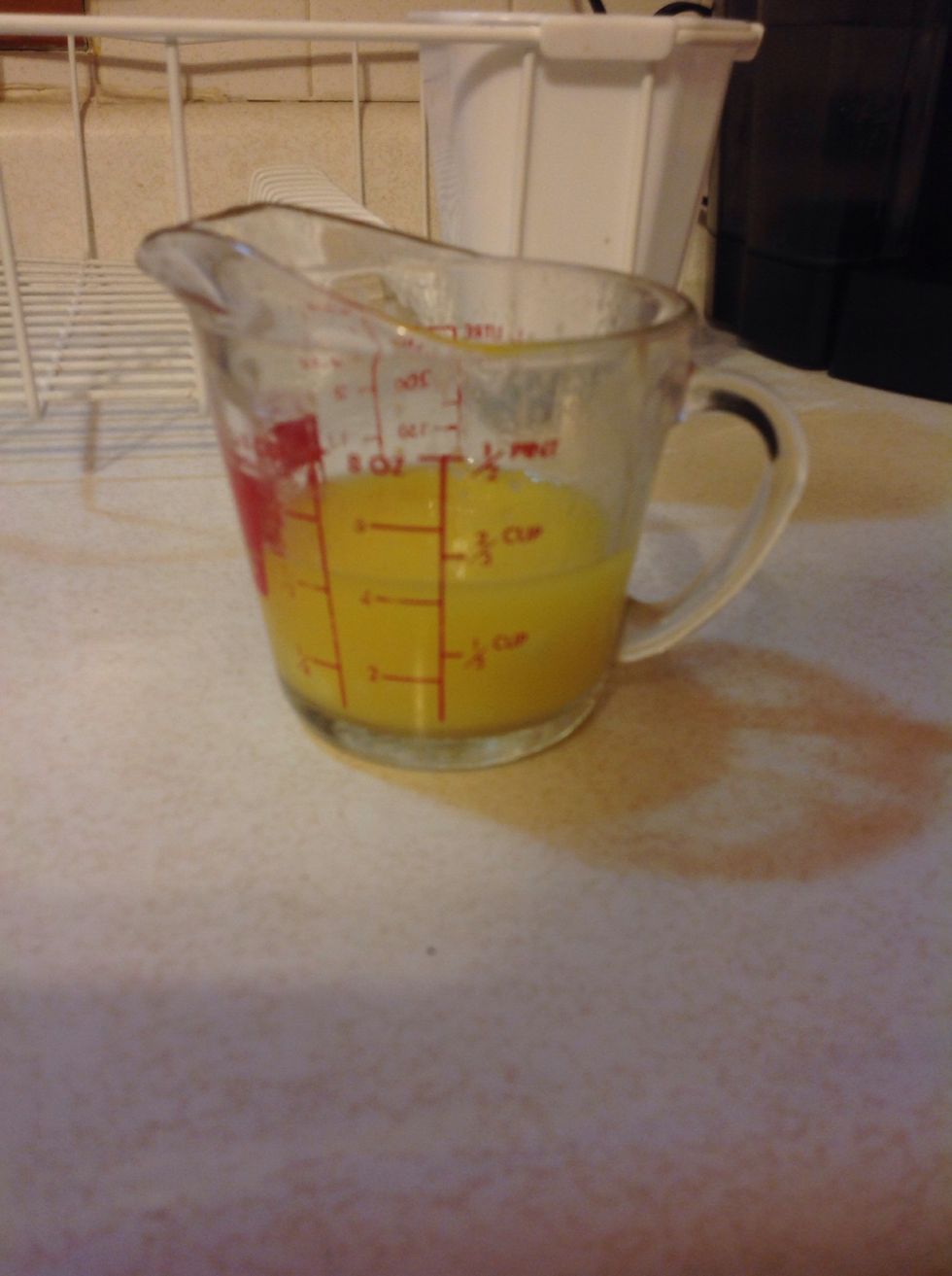 First preheat the oven to 450 degrees. Then melt a tablespoon of butter