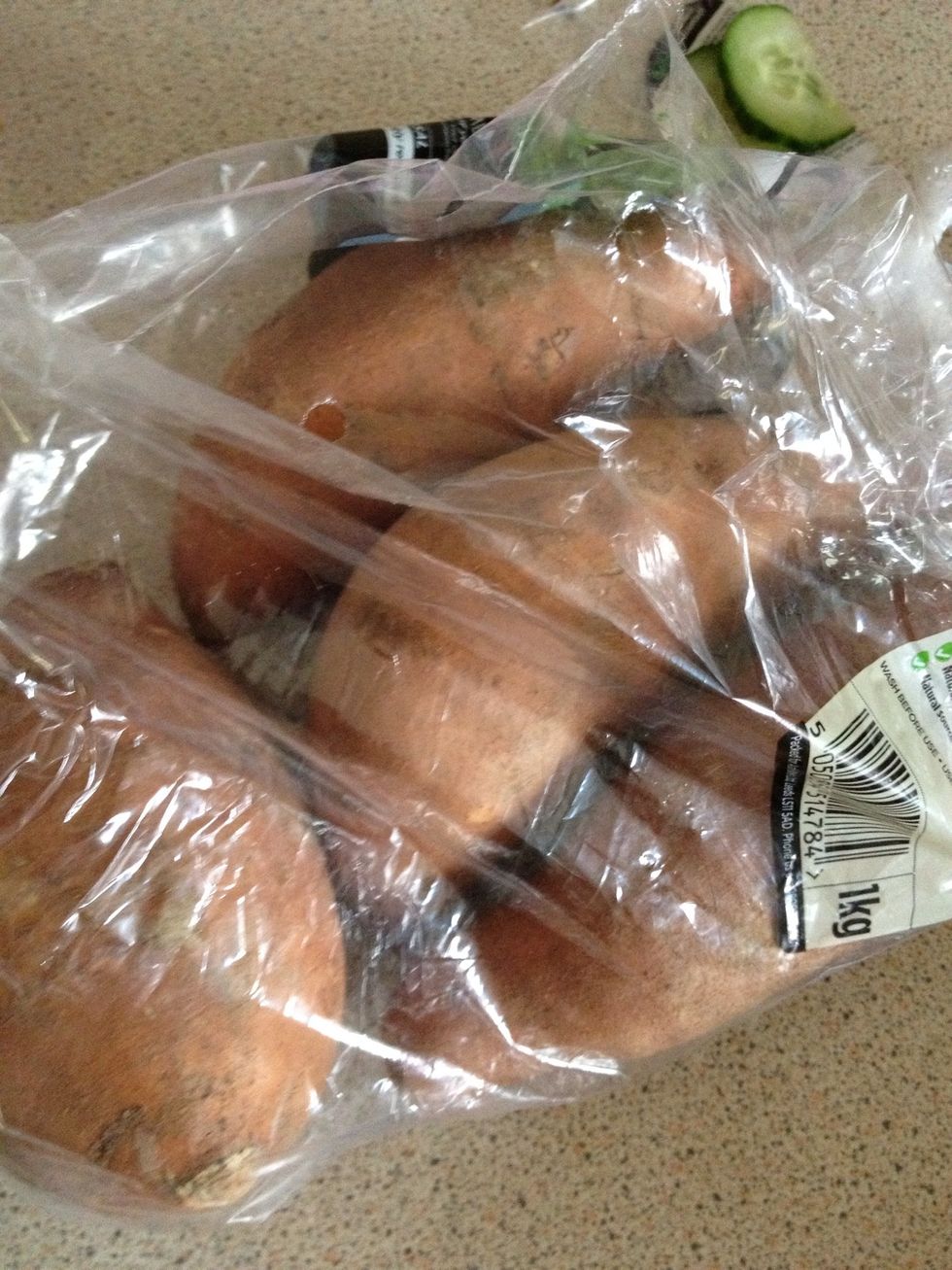 First preheat your oven to 200C or 180C if it's a fan oven. Take 2 small sweet potatoes. They are quite large usually, so this should be enough.