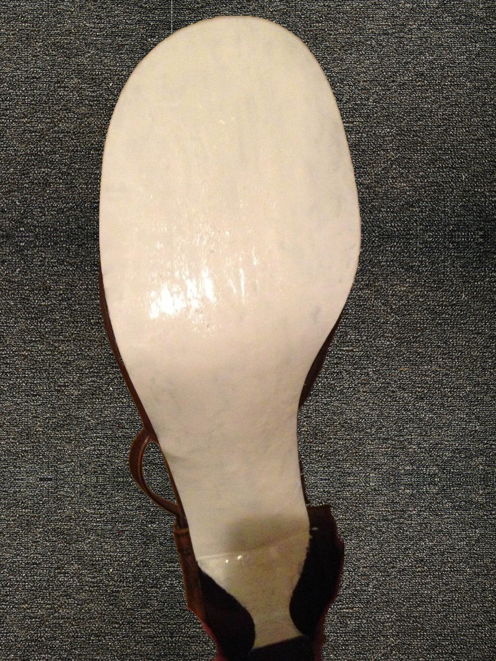First, prime your heels.  I had to do two coats. It's easier to pour the polish onto the shoe and then brush it around on the sole. The other way makes it lumpy.