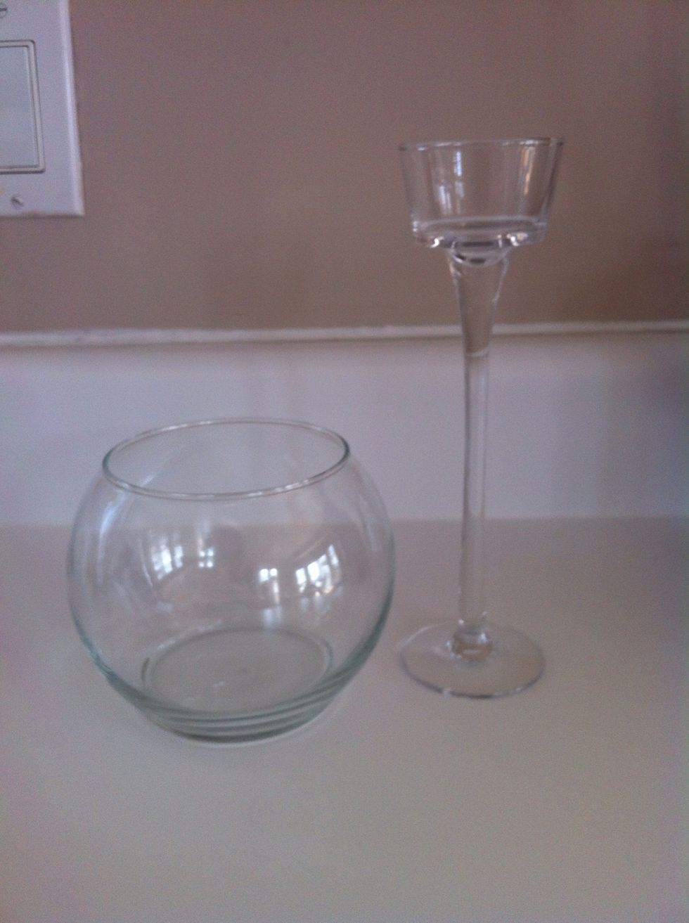 First purchase a small glass fish bowl vase and a tall glass candle holder ( I got mine at a local dollar store).