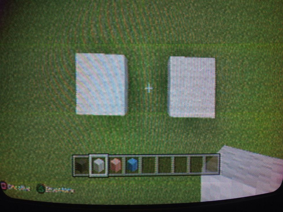 First put 4 blocks in white next to each other . Make sure you do this twice . Also make sure there two blocks away from each other .