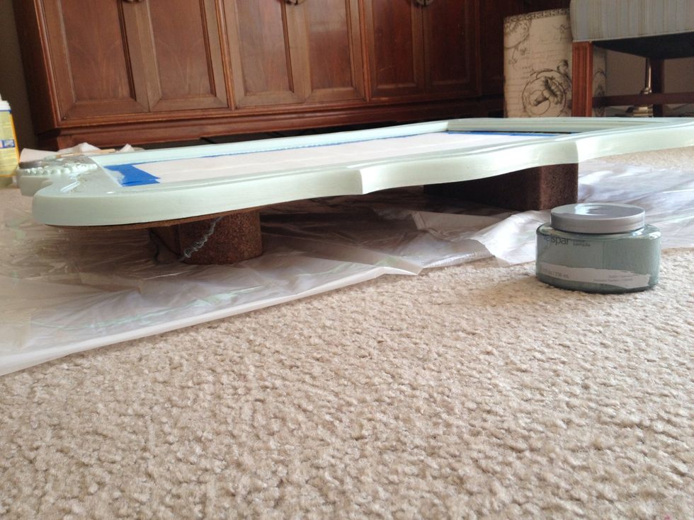 First, put down some plastic. Trash bags worked for me. Then put some bricks or wood underneath so the plastic didn't stick to it when it dries. ( I forgot this step until the end if the 1st coat. )