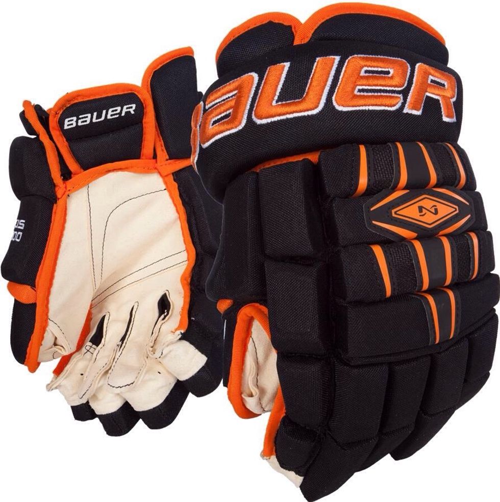 First put on the hockey gloves on your hands.