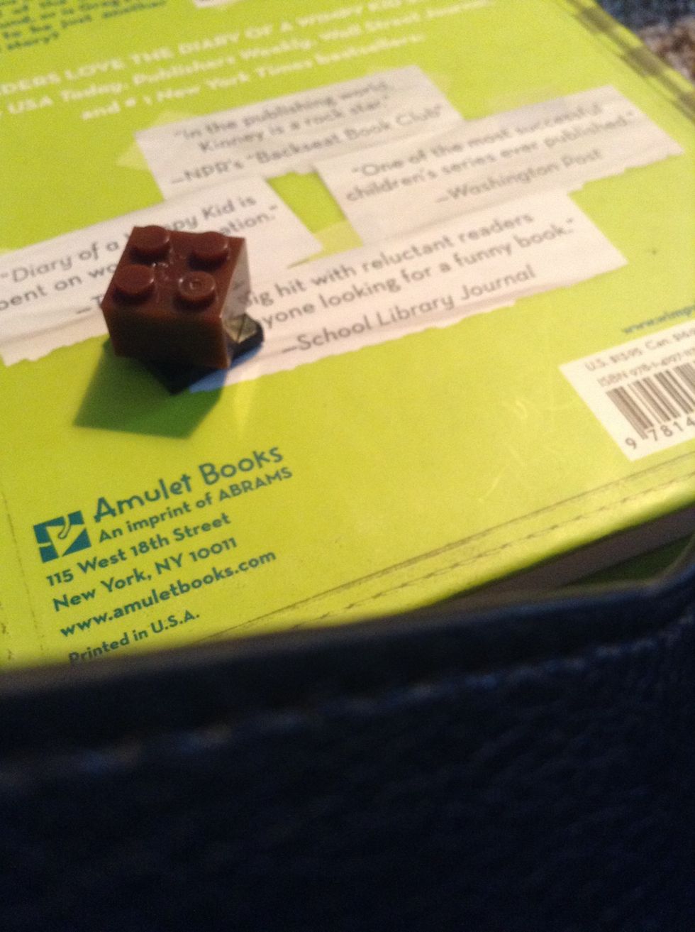 First put the four peg block on the spinner.