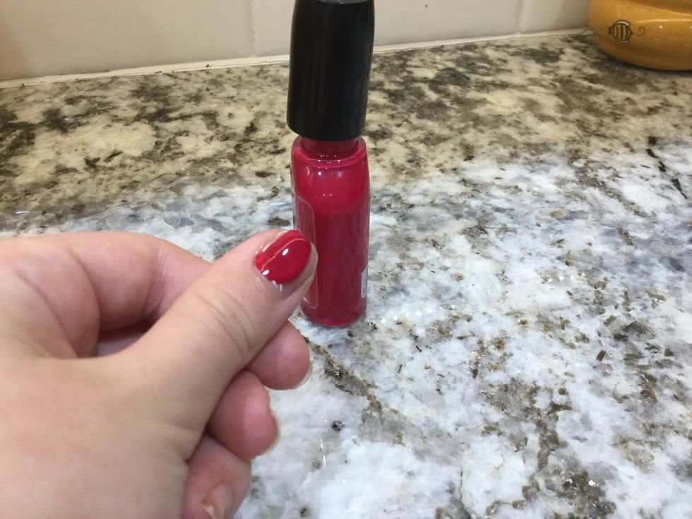 First, put the red nail polish on.\ud83d\ude00