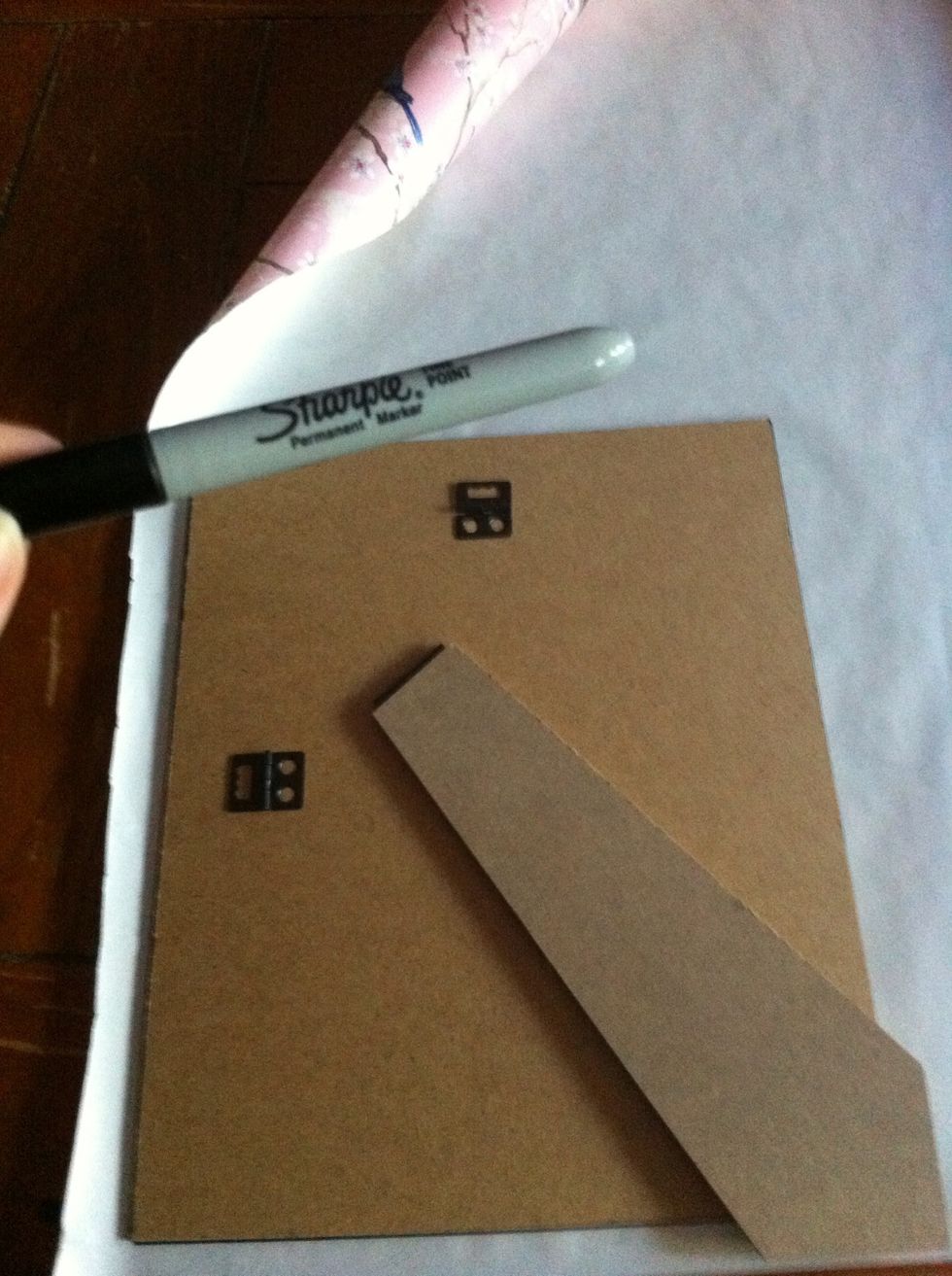 First remove the backing from the frame