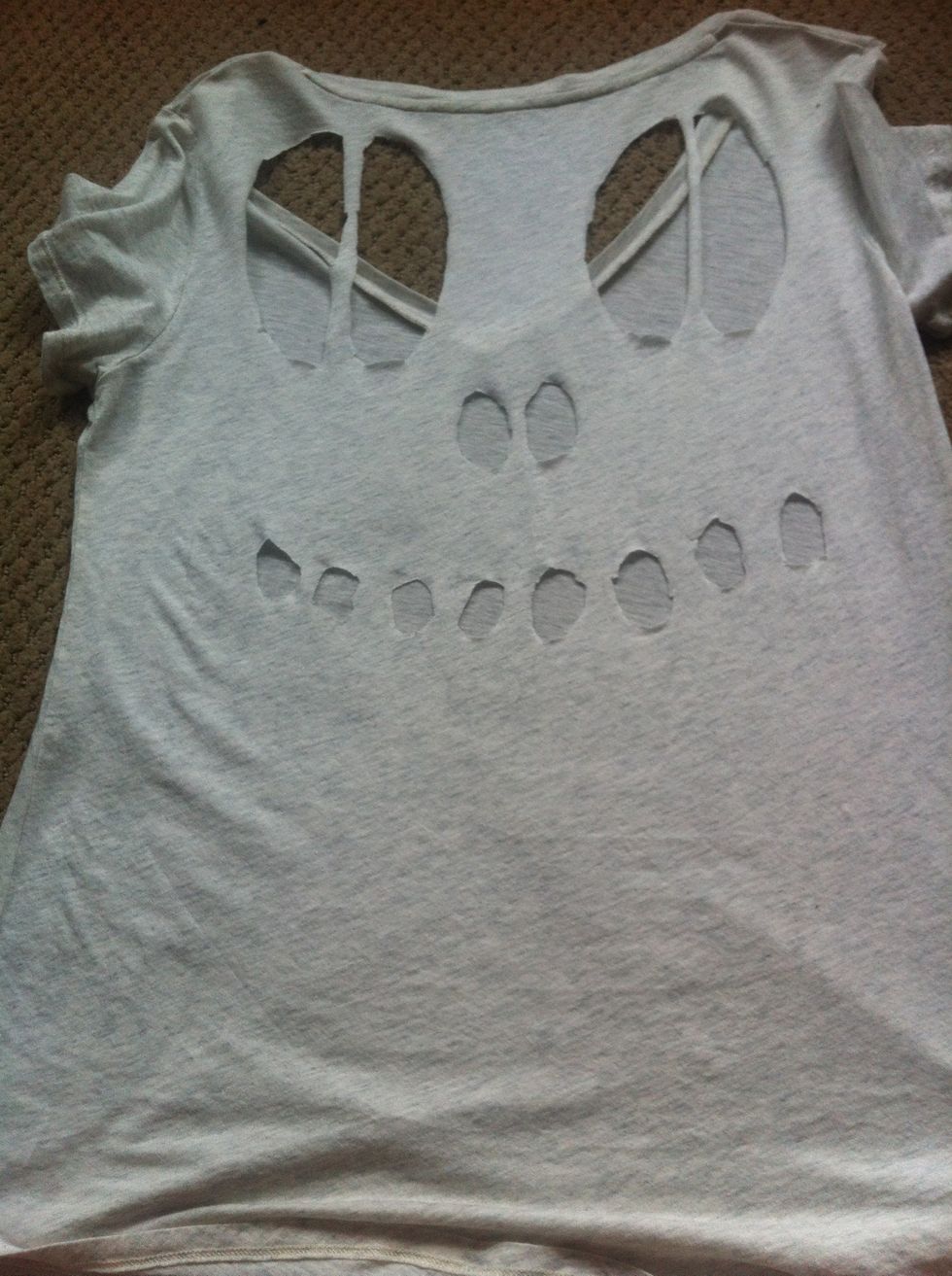 First row of teeth. He's a smiley guy.