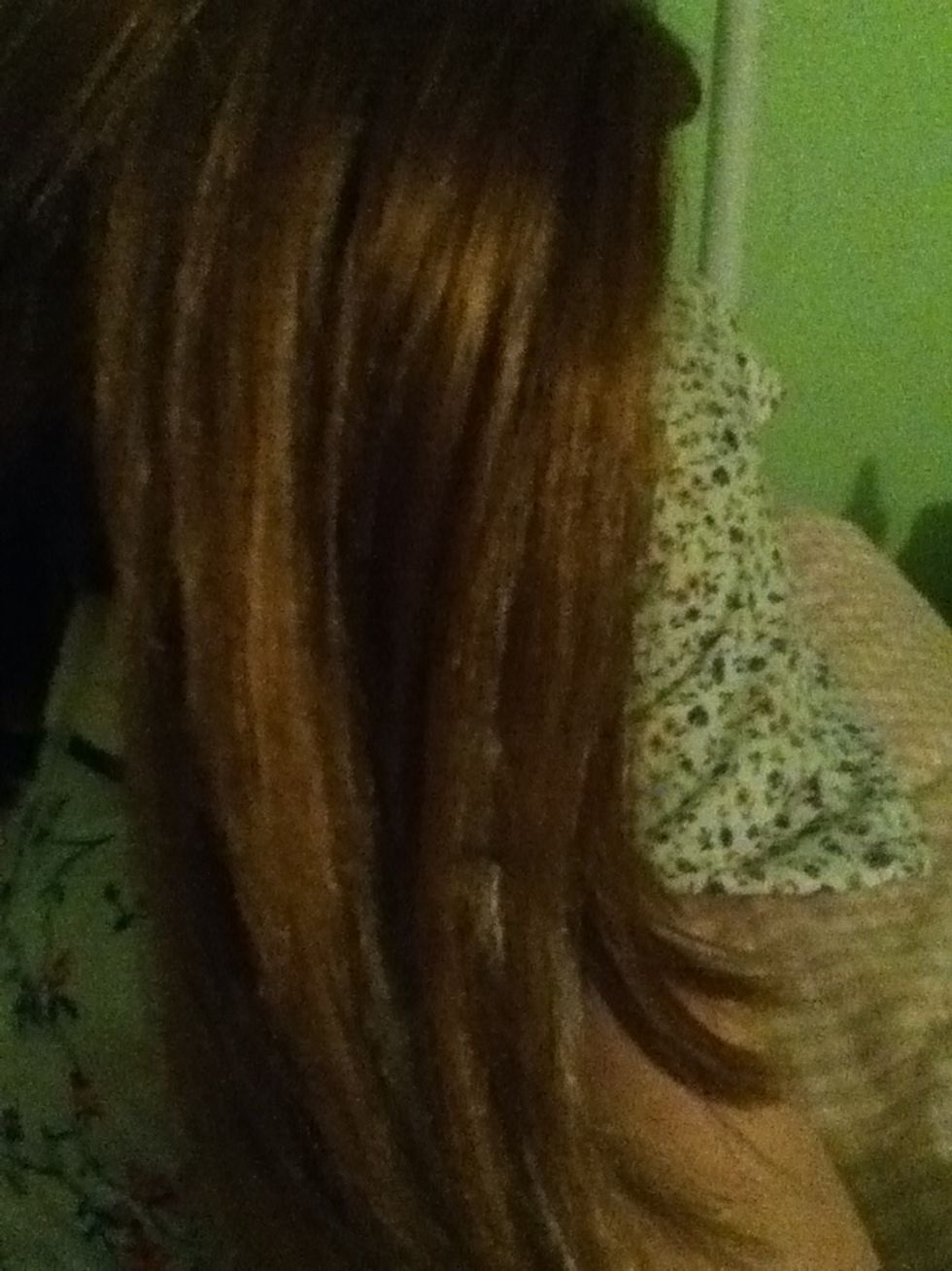 First separate the section of hair you wish to braid from the rest of the hair. ( I'm using my sister's American girl doll)