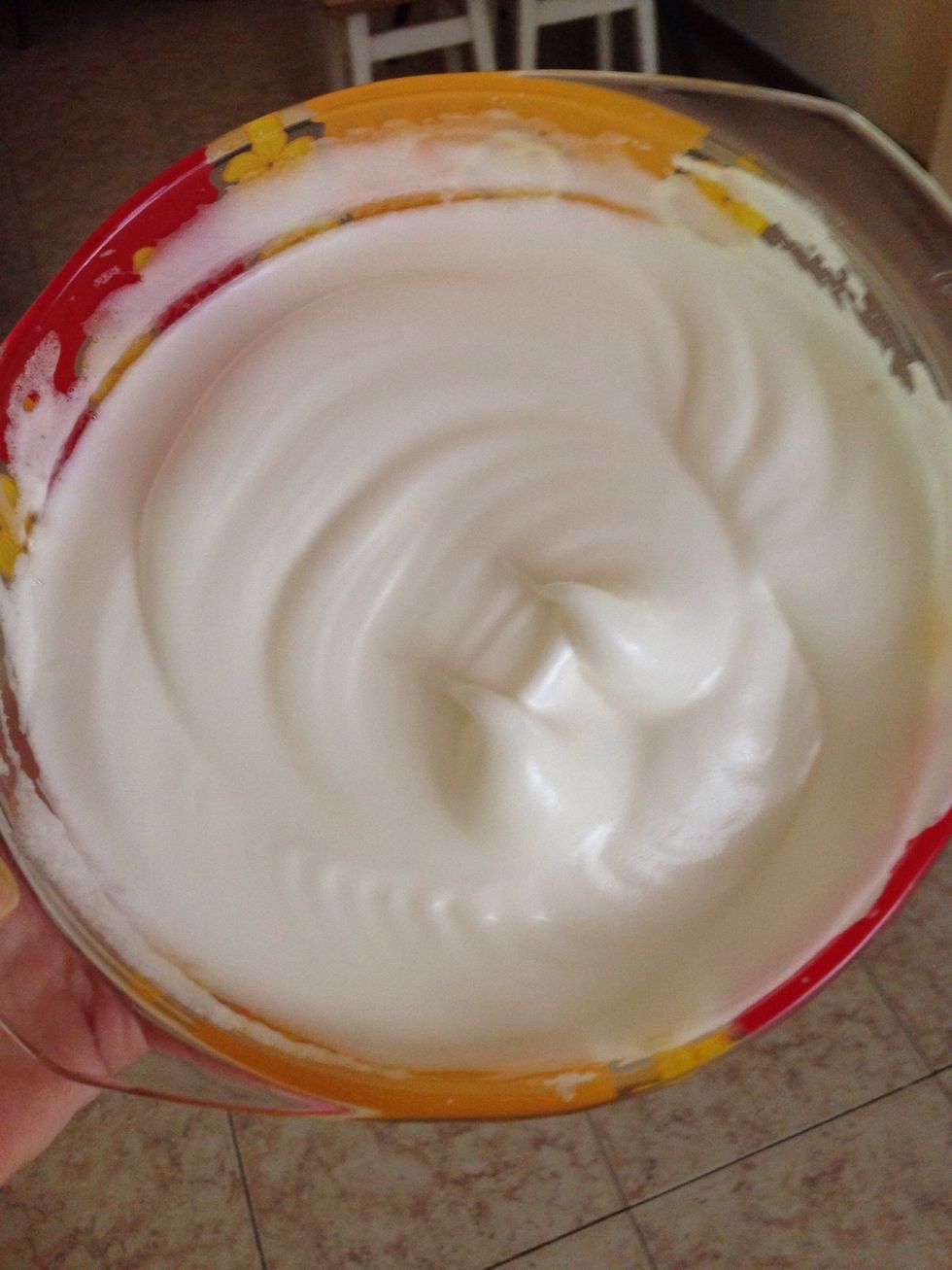 First separate the whites and beat  with half cup of sugar until stiff and firm. Set them aside( 7 egg whites)