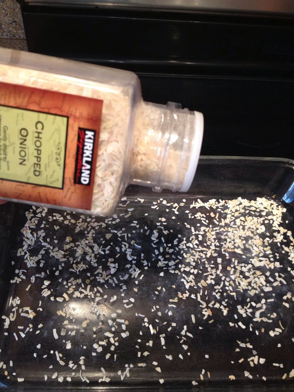 First sprinkle dried onion on the bottom of your glass 9x13 pan.