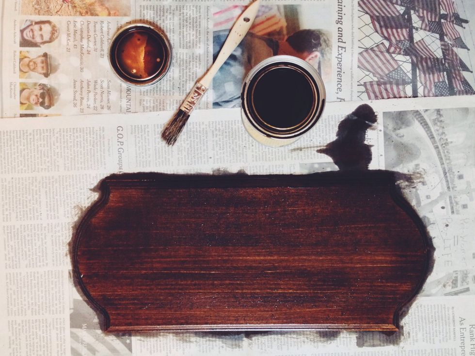 First, stain your wood. (you may skip this step if you like the untreated look) You will want to lay down layers of newspaper and be careful not to spray when painting.