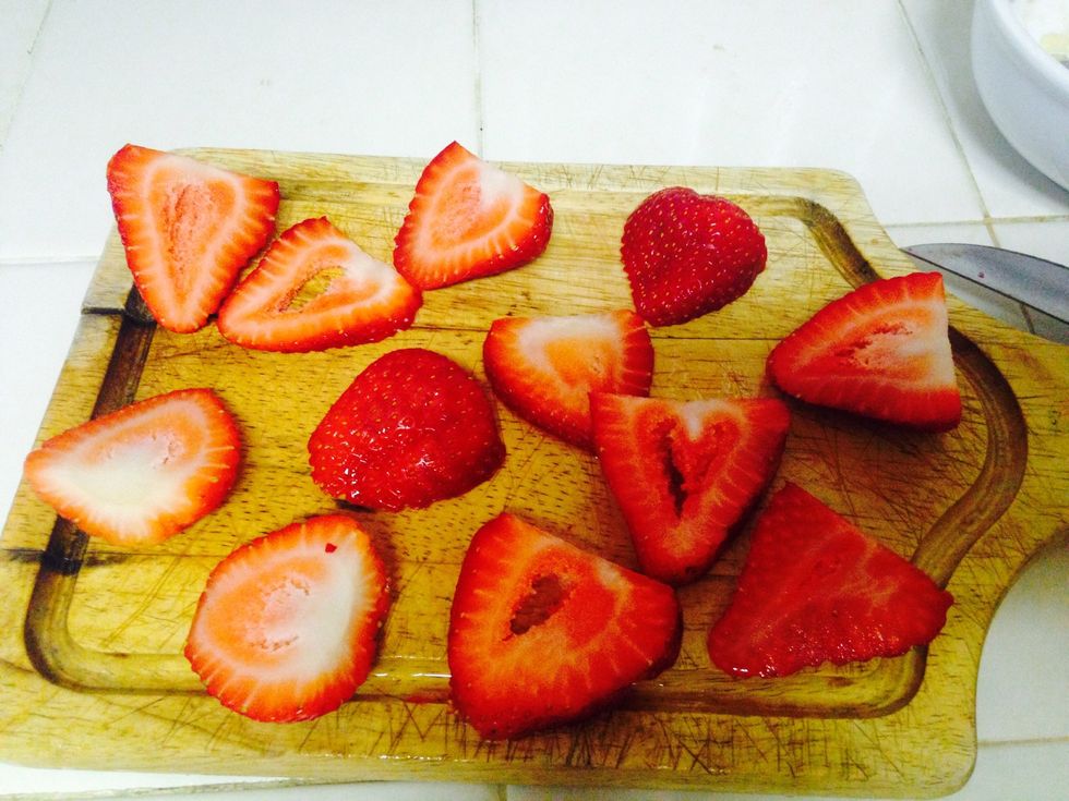 First start off by washing and cutting strawberries to your desired size
