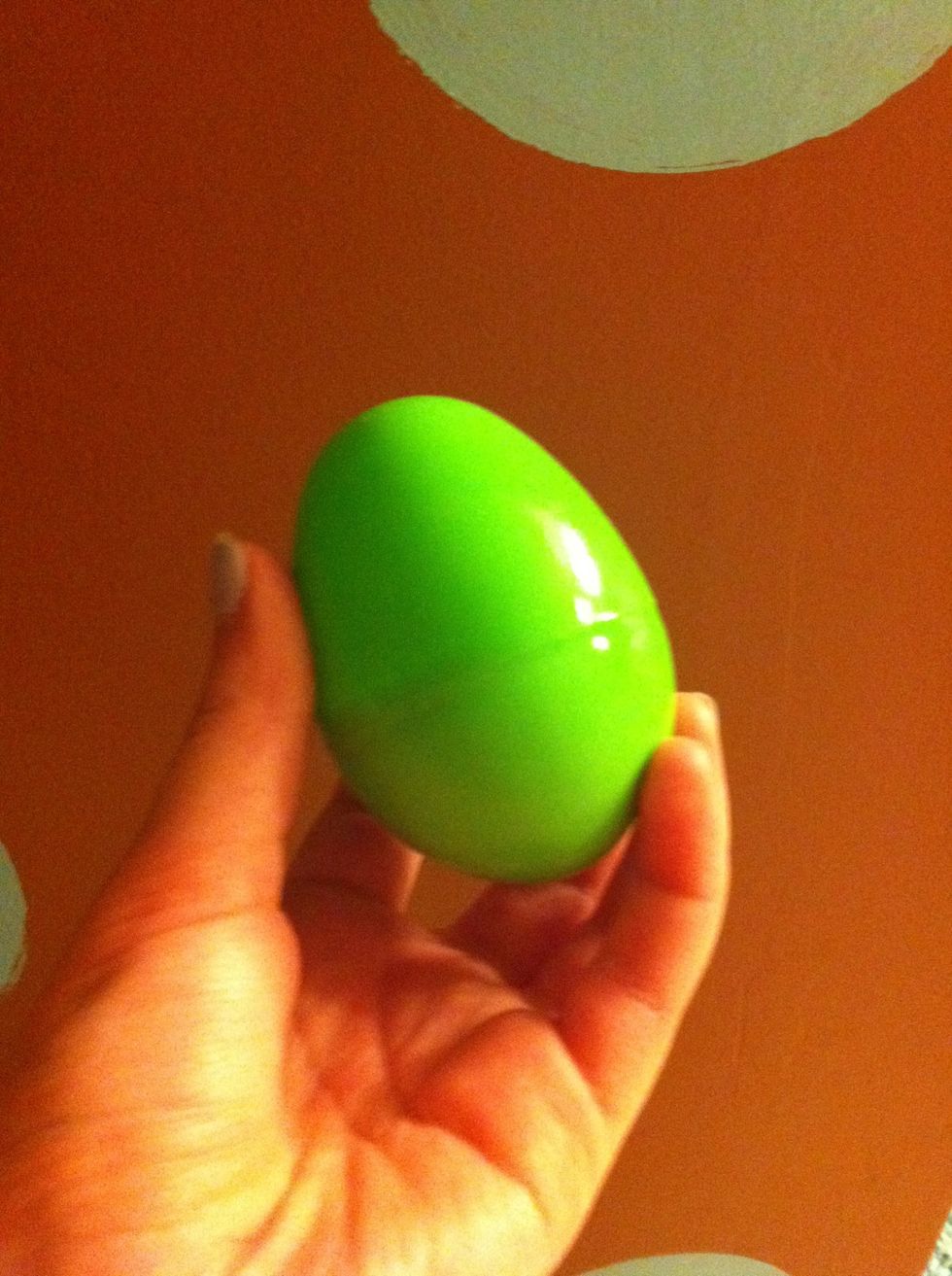 First, start off with a regular plastic Easter egg.