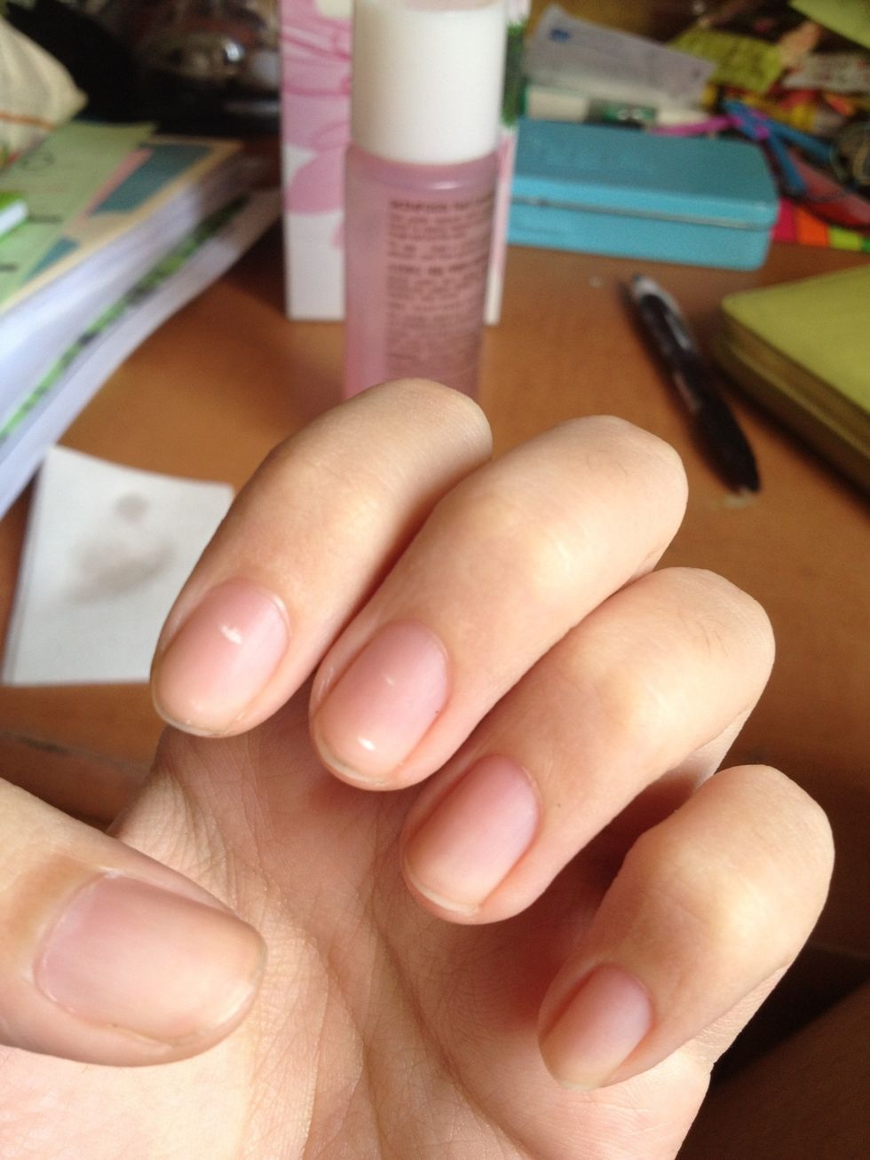 First, start off with clean nails. If you had polish on before, clean it all off.