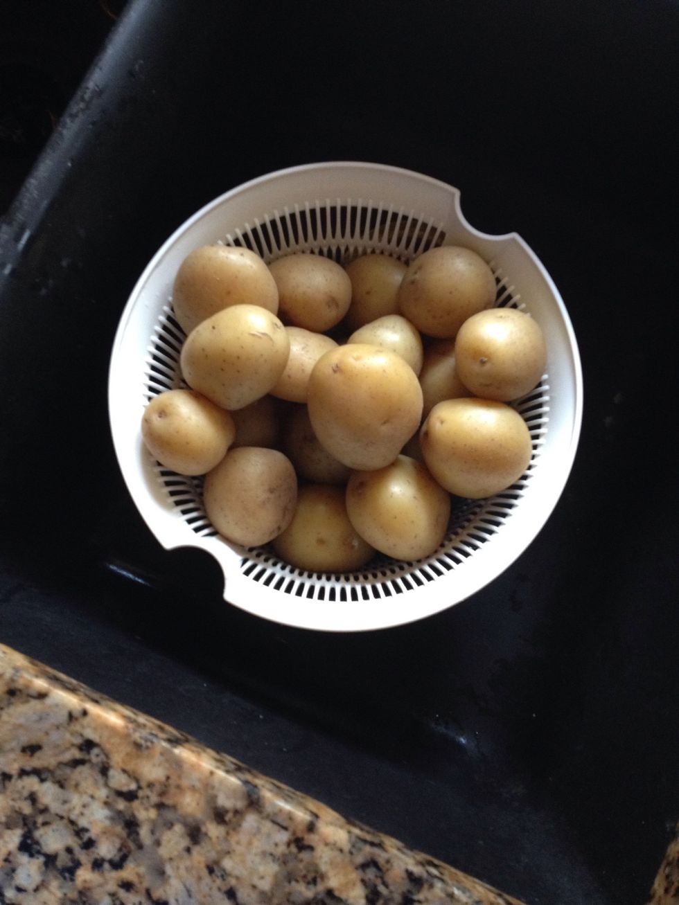 First, start with cooked potatoes. Drained and cooling. I used a bag of yellow. I prefer the golden potatoes to any of the white but you can use which ever you like