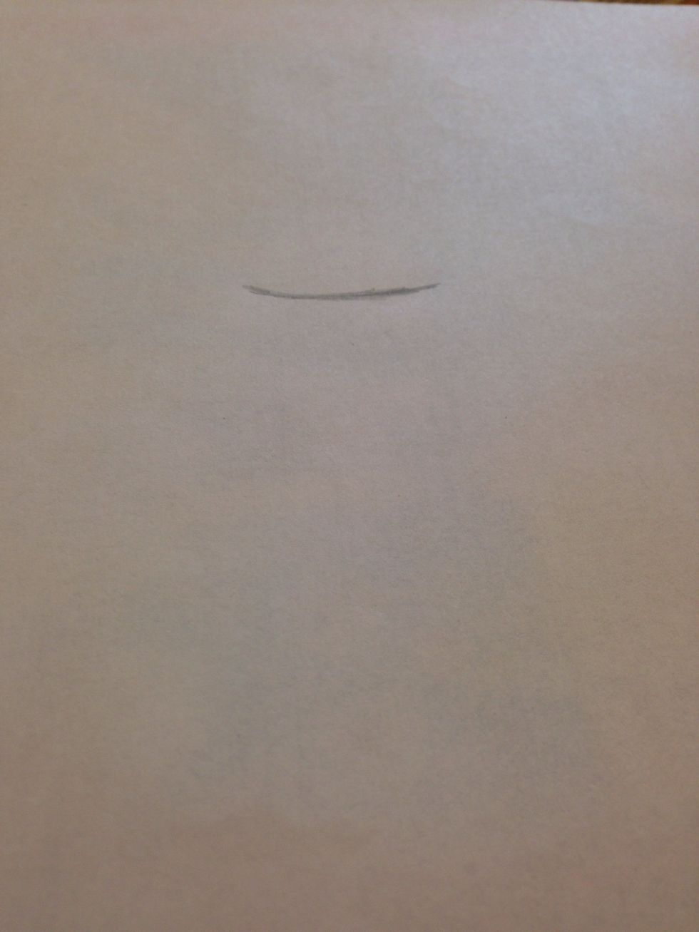 First start with drawing a long, curvy line on you paper, don't make it too long but just right  This is the lower part of the eye