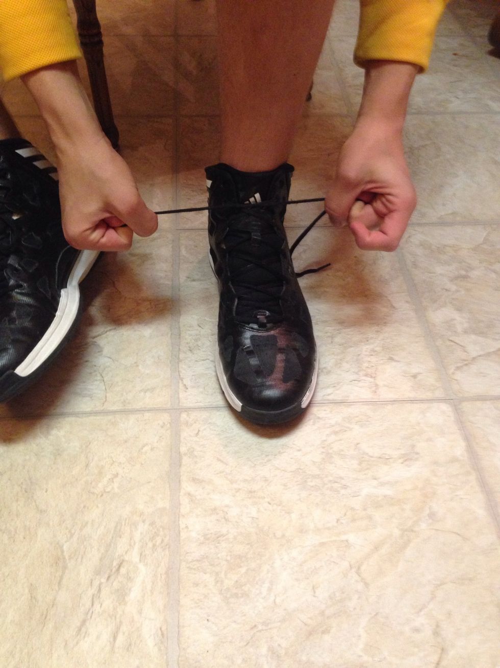 First step is to lace up your basketball shoes, or tennis shoes.