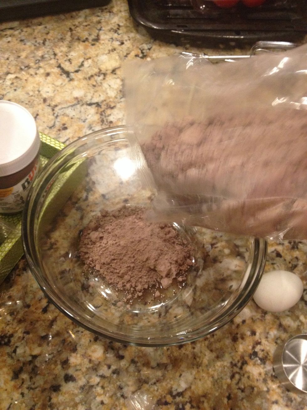 First step is to place brownie mix in a medium size bowl