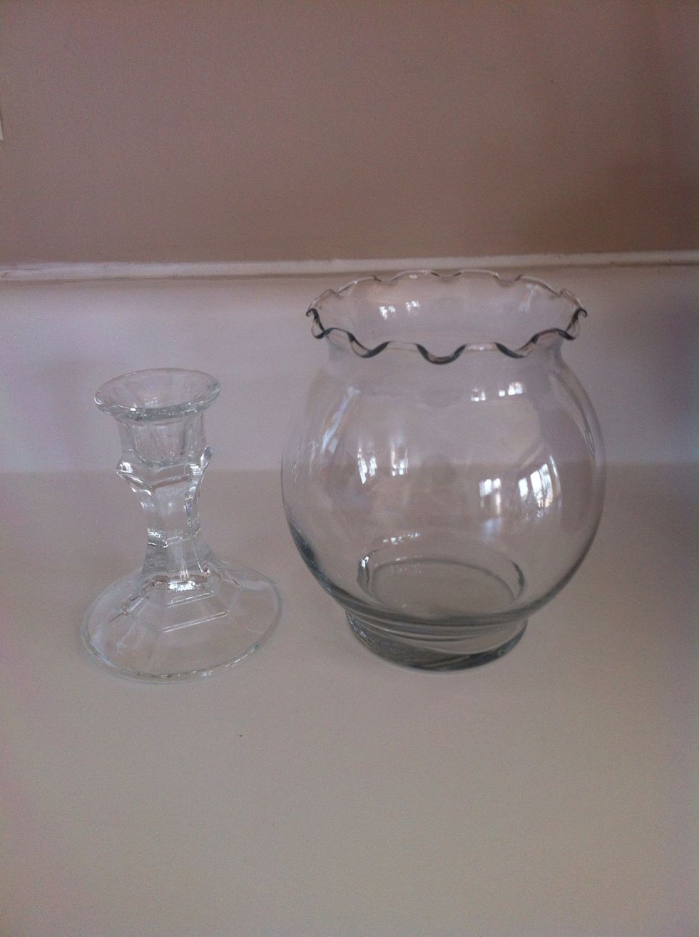 First step is to purchase a candlestick and a glass vase (I got mine from a local dollar store).