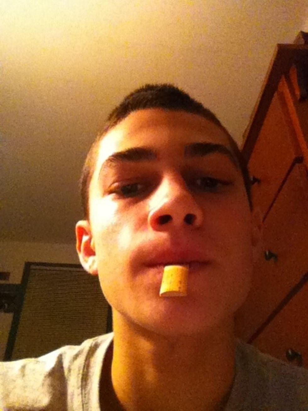 First, suck on your reed so that it becomes wet and soft.