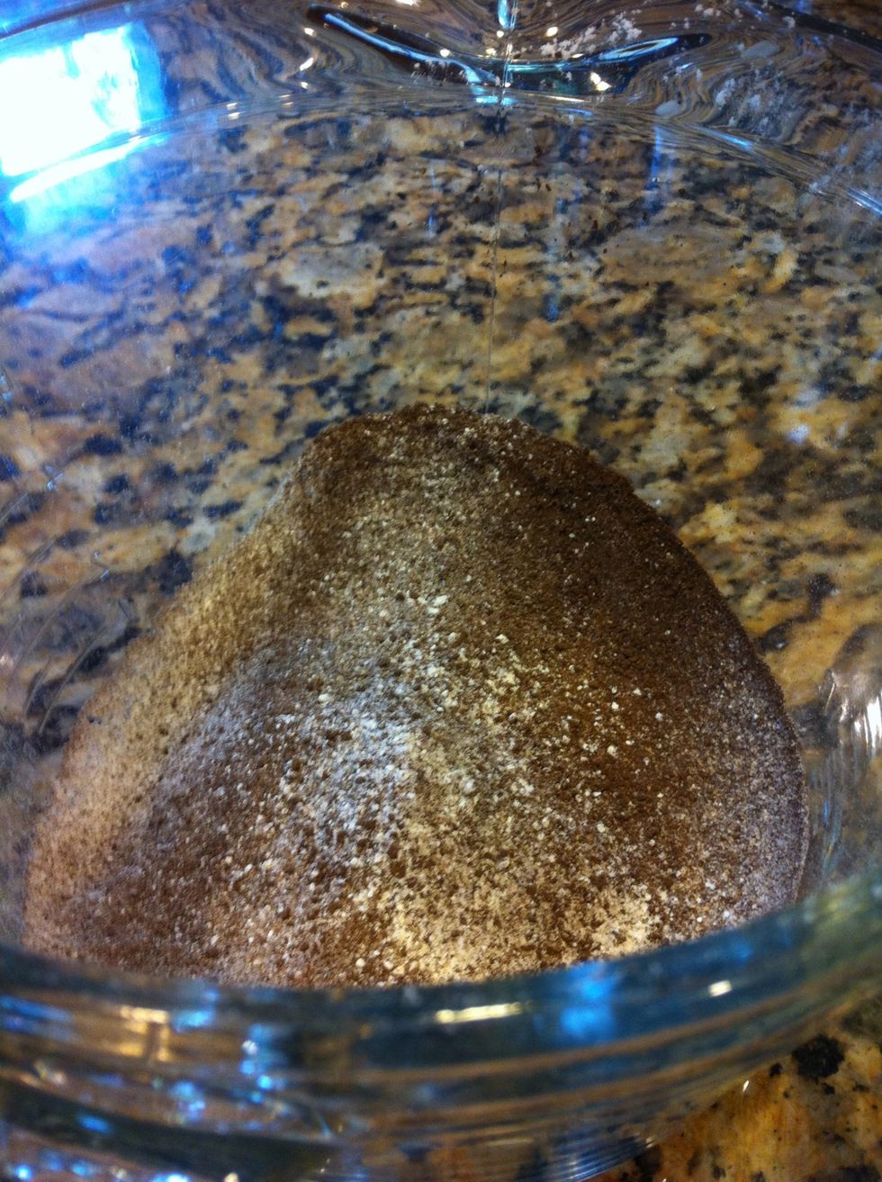 First, the cake part: sift 1/4 cup dutch processed cocoa, 1/3 c plus 2TB cake flour, pinch of salt. Sit aside the dry ingredients. Now melt 4TB butter. Let that cool