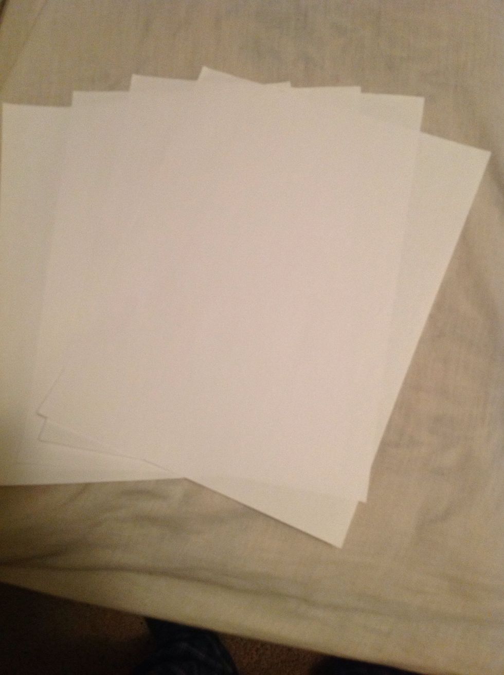 First thing you do is get four sheets of paper.