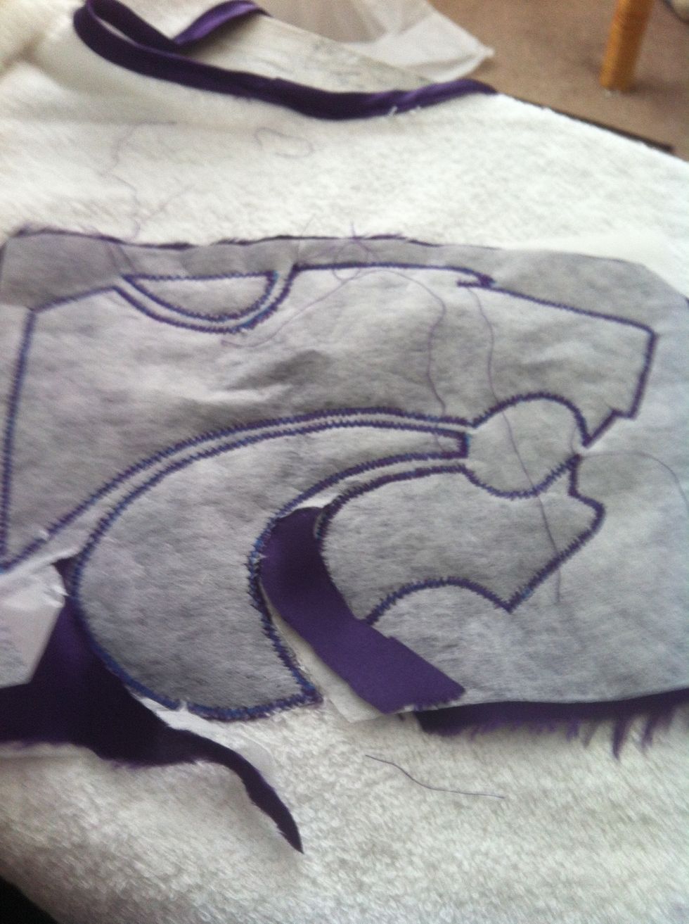 First using this. Carefully cutting away extra fabric & tearing stabilizer away. We'll see what is revealed. Hopefully a pretty awesome powercat.