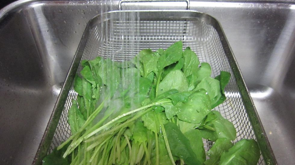 First wash the spinach. Make sure you wash it well and cut out any damaged leaves. Sometimes these leaves might have bugs on them which is why you need to wash it well.