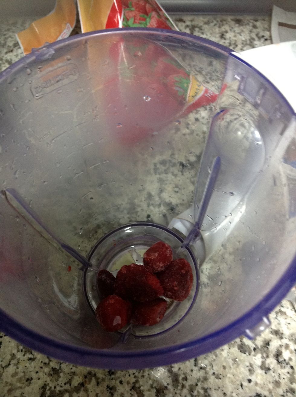 First we but the strawberry inside the blender