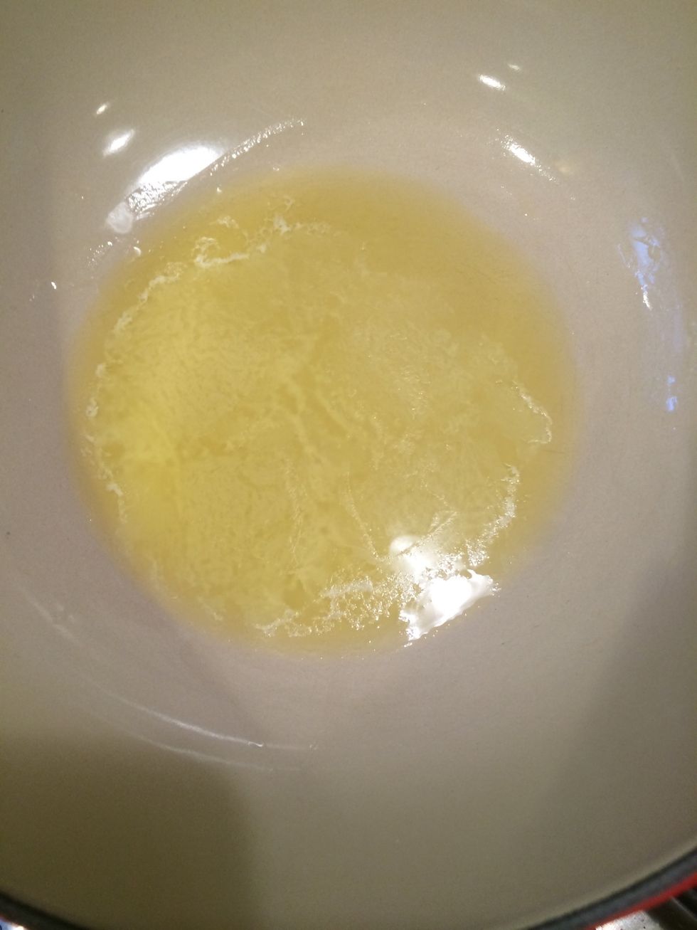 First we make the bechamel sauce. Well, actually, first I preheated the oven to 350. Melt the butter on med low heat in a med sized pot or Dutch oven as I have here. Do NOT let it brown!