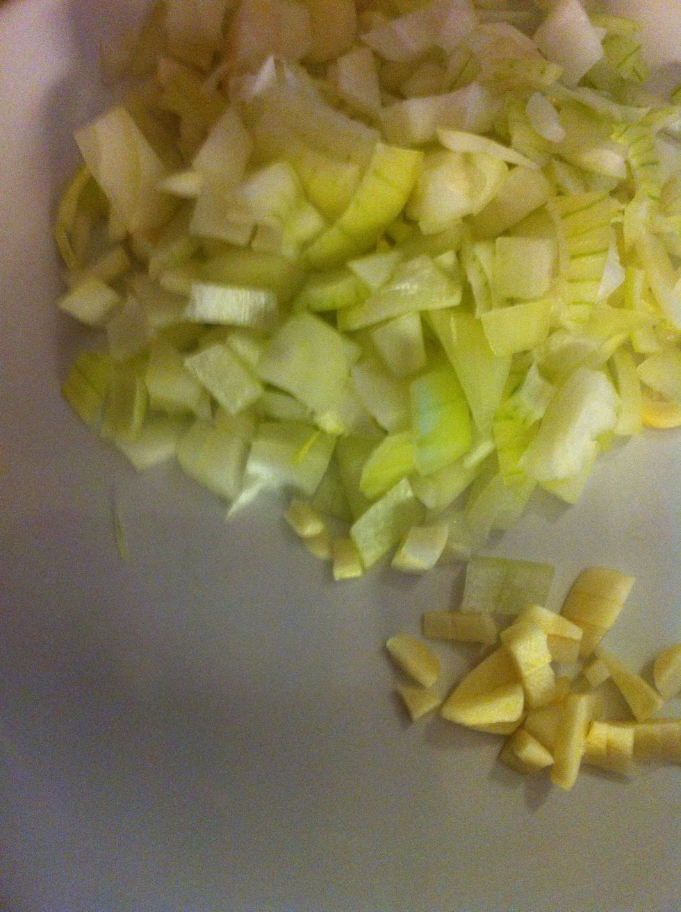 First we need to chop onions and garlic in small pieces.