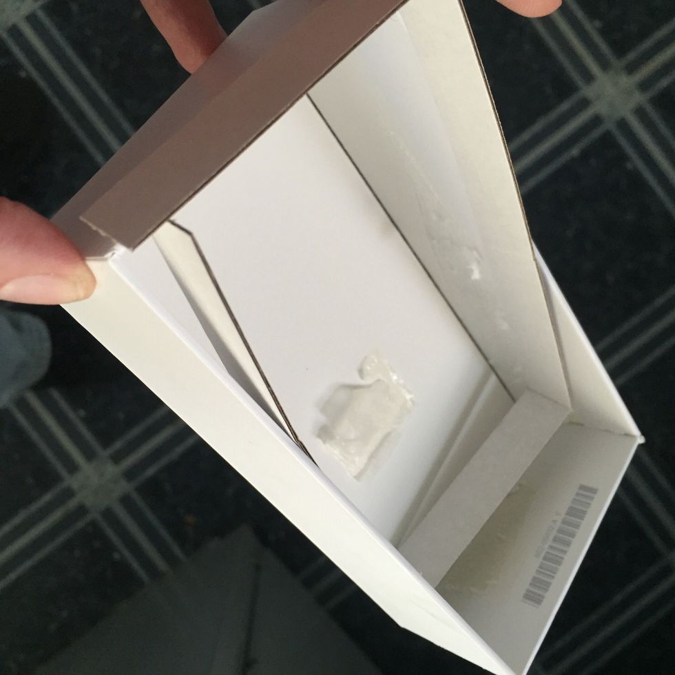 First we're going to remove everything from the inside the box. They're glued in so use a knife to carefully remove everything. But don't ruin the pieces. It's all used.