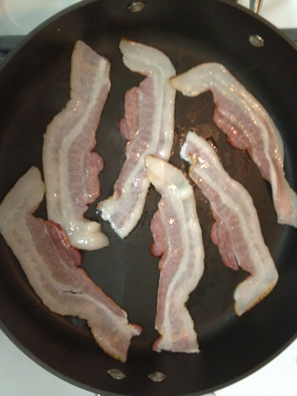 first, we start by cooking up some yummy bacon (no, not the maple kind.) we cut the bacon in half before cooking, to fit the sandwiches.