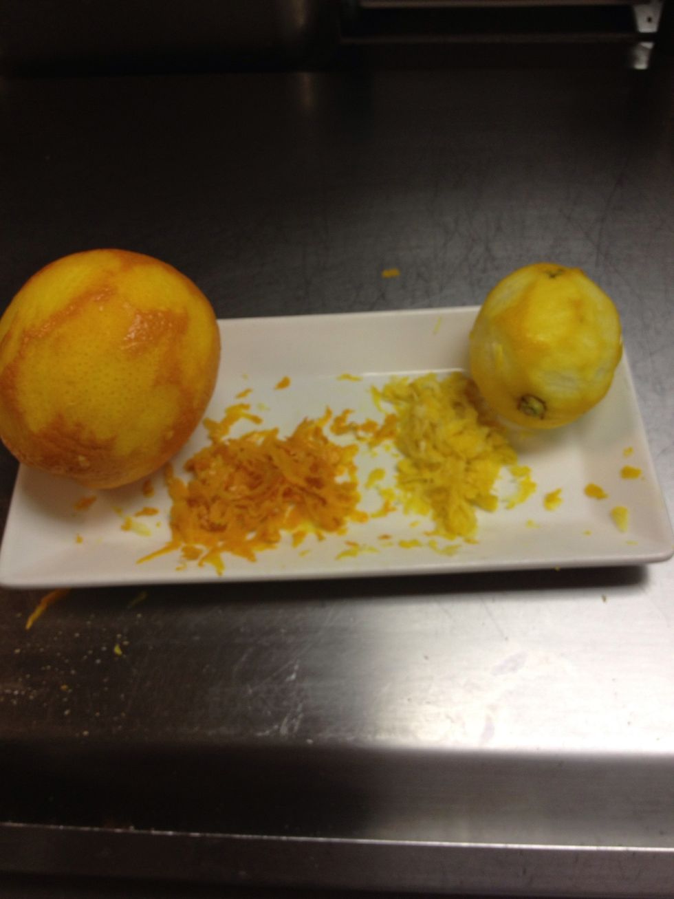 First we take off the zest of the 2 lemons and 1 orange