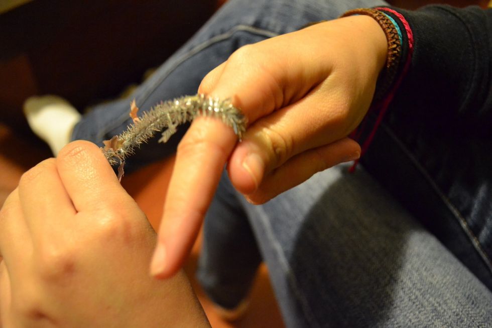 First with your index finger wrap around the pipe.