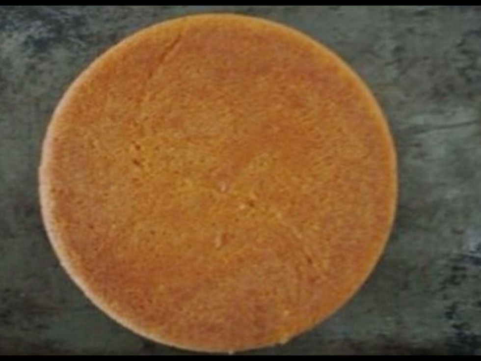 First, you can buy or make a simple cake with the round shape