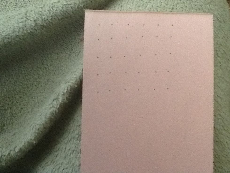 First you draw a grid of dots on the paper. I put 6 across and 5 down.