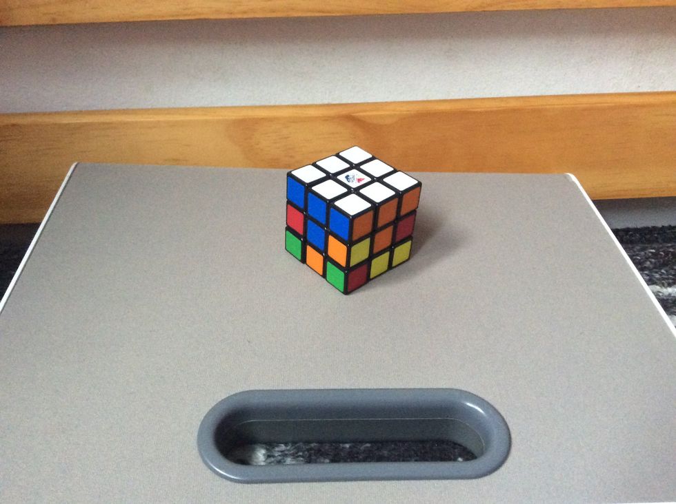 First, you have to get all the white, and the top row of each color to match. I will show you in the next step.