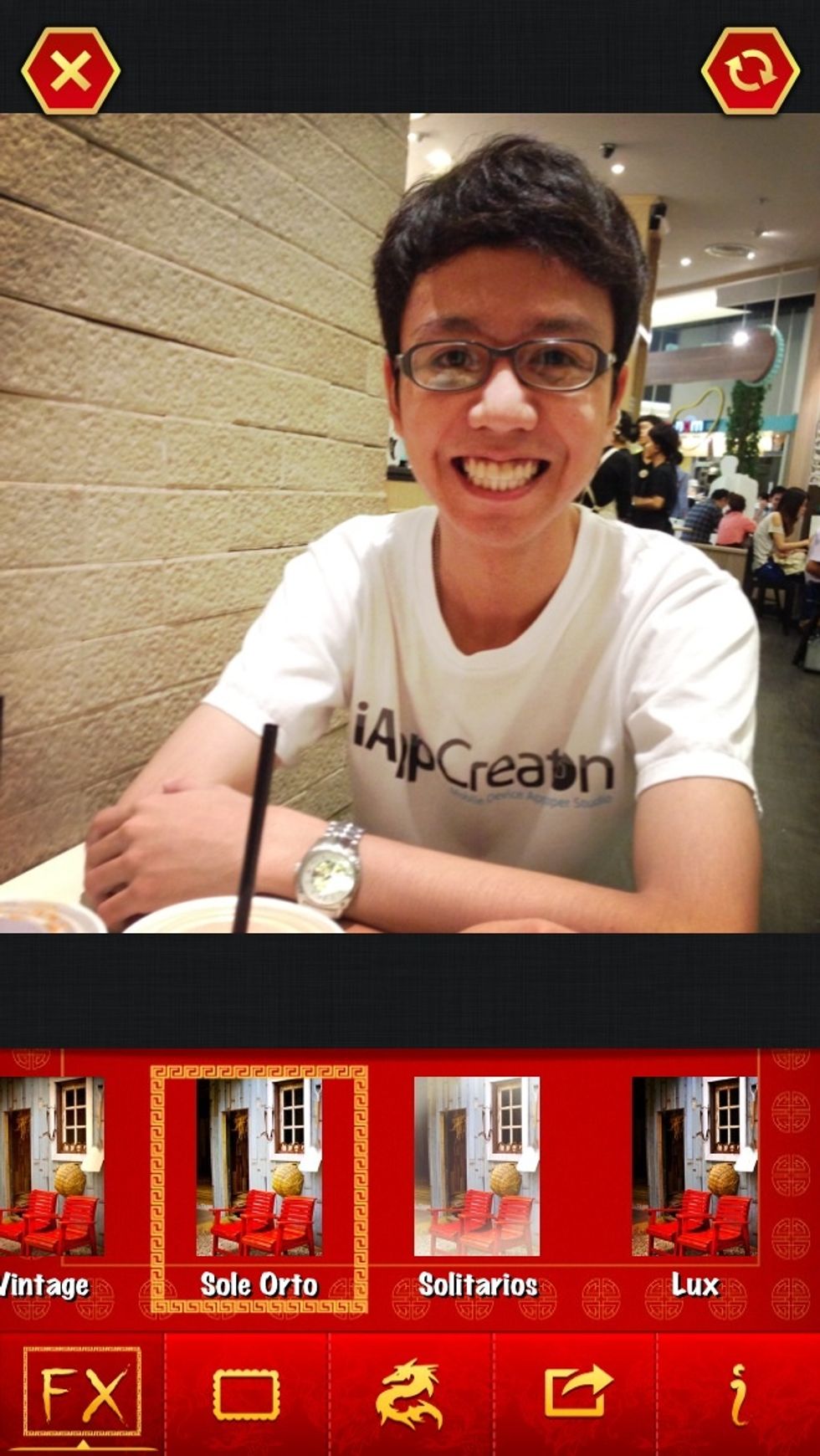 First, You have to take a photo or import from you camera roll. Then, choose a filter that you like most.