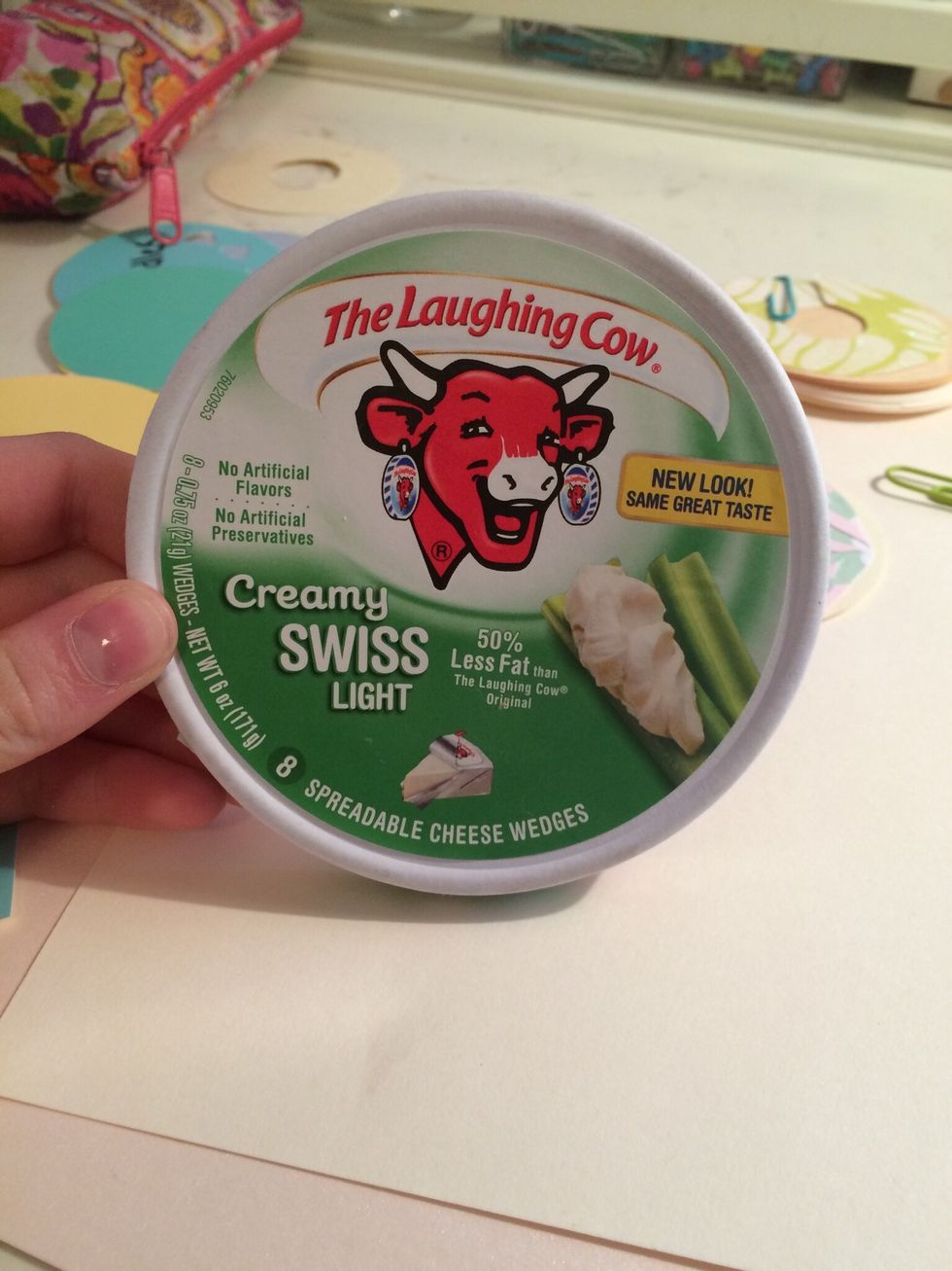 First you'll need a round cardboard box to turn into you're plate. I'm using this empty Laughing Cow box.