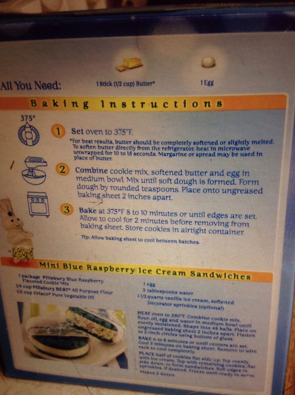 First, you mix your ingredients the egg and butter like what the directions say. You might want to turn your oven on.