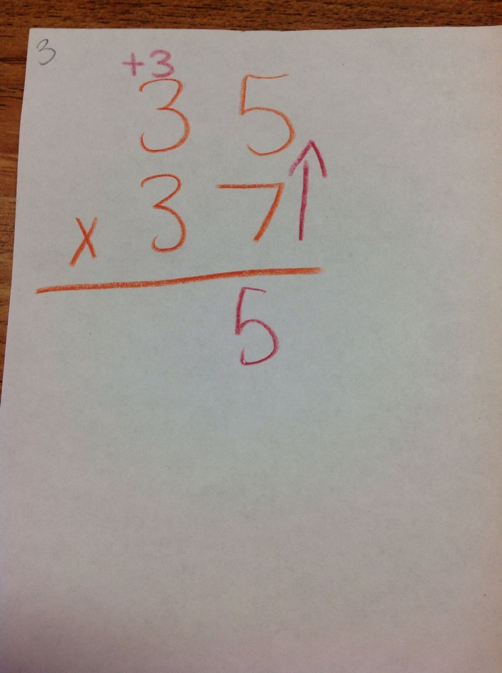 First, you multiply the 2 values in the ones place. 5x7= 35, so I put my 5 in the one's place and carried my 3 tens to multiply with the tens place.