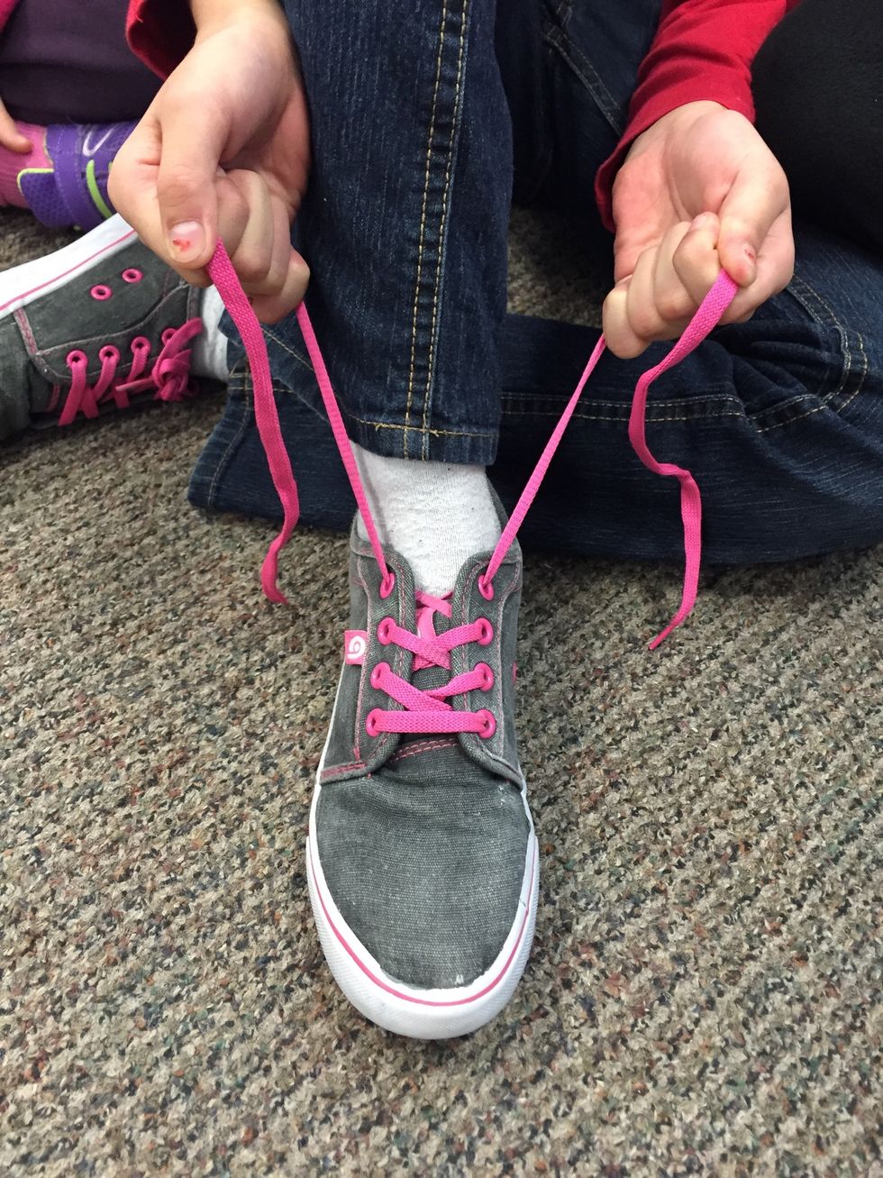 First, you must pull your laces tightly to ensure your shoes are on tight.