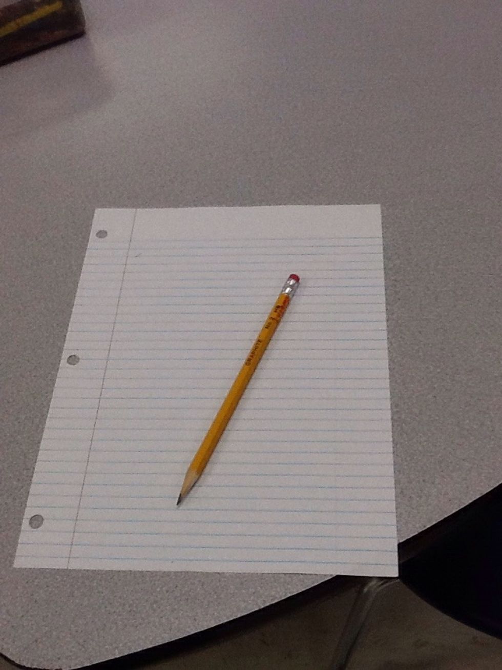 First, you need a piece of paper and pencil like shown above.