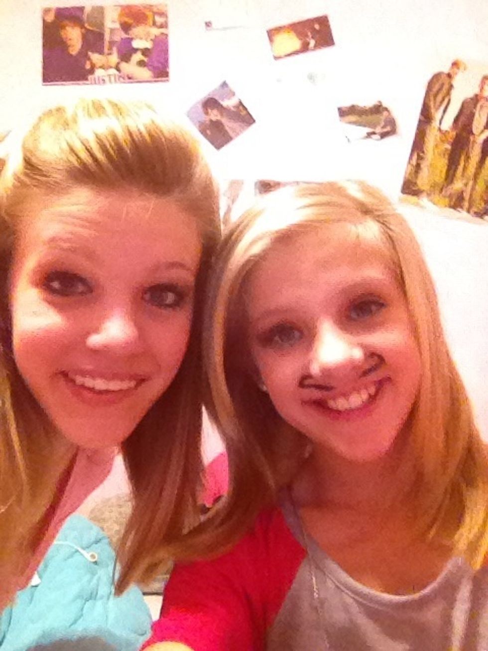 First you need Friends(: Then you take your hand and put it behind your back and make it look like a fin.