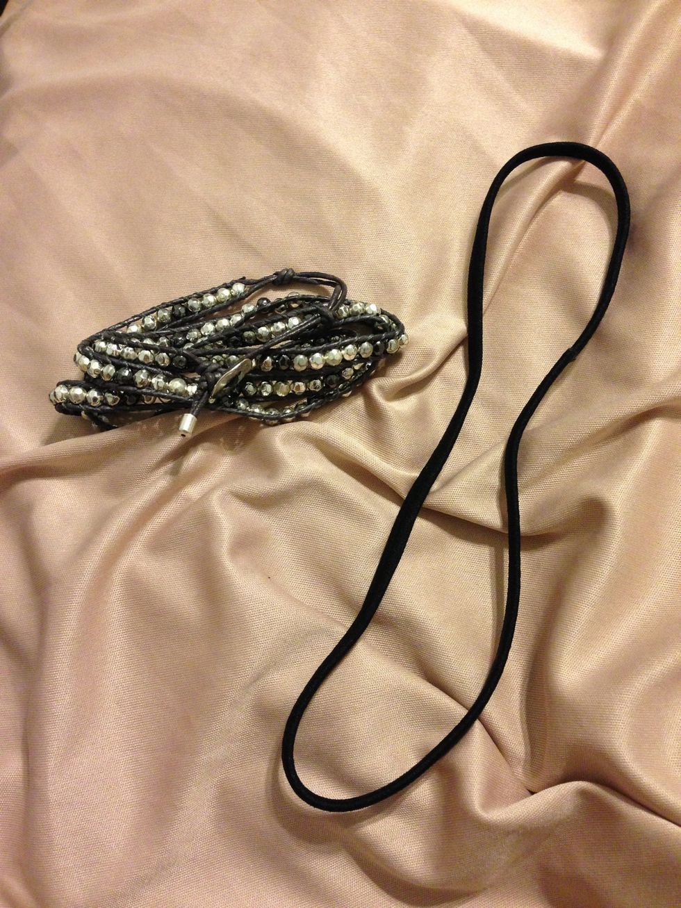 First you need the It's a Wrap bracelet by Premier Designs (or any wrap bracelet you own) and a black elastic headband.