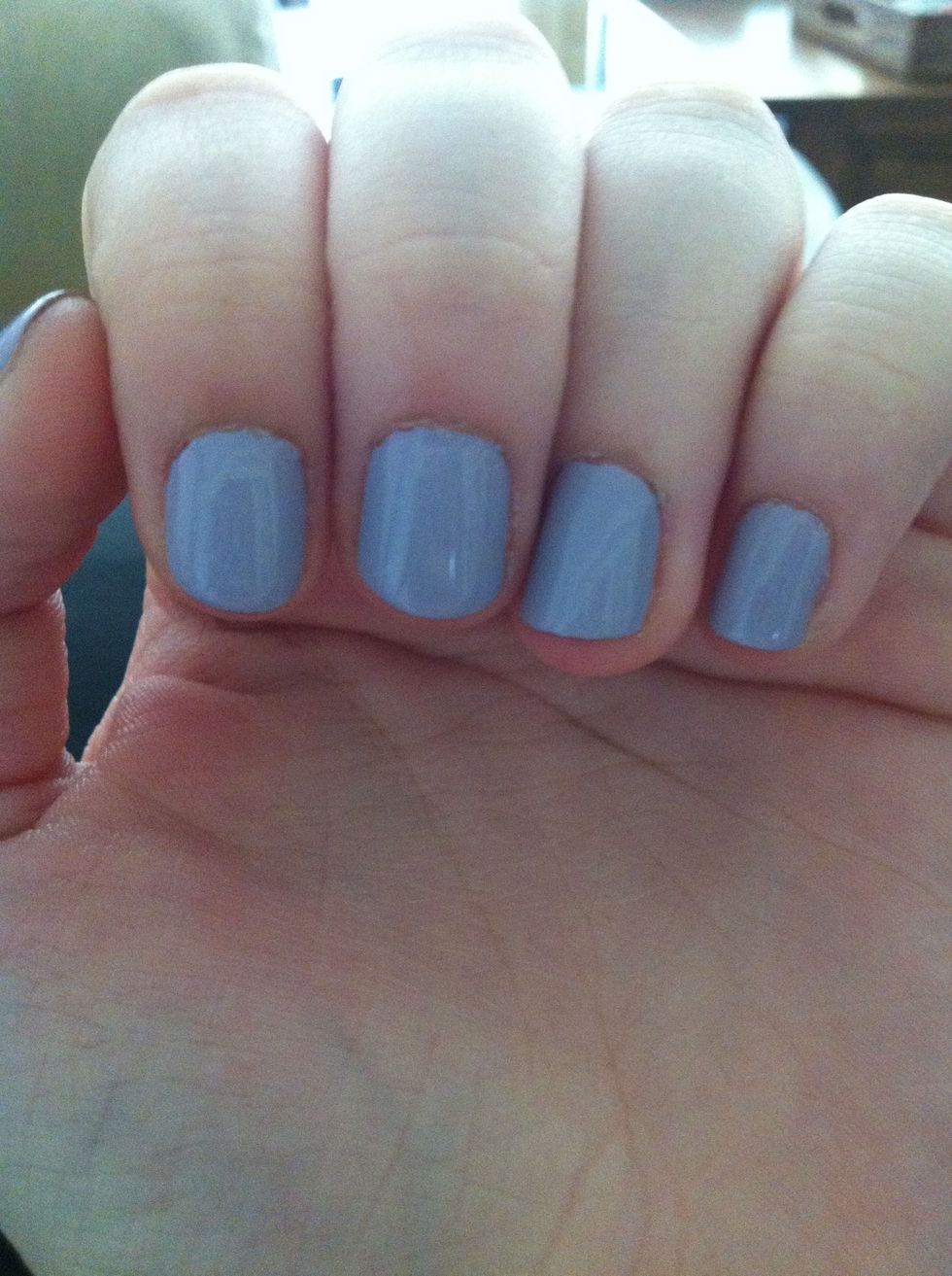 First you need to clean up your nails. Make sure no polish is on them already and lather lotion onto your hands to soften your cuticles.