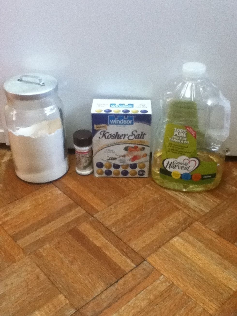 First, you need to gather all of the ingredients. You will need flour, salt, cooking oil, cream of tartar and water.