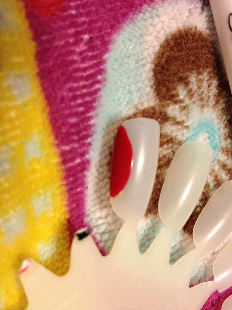 First you need to have all your colors out and ready to go.. This is a fast pace design because we rely on the polish being very wet.. Add your fist color.. RED