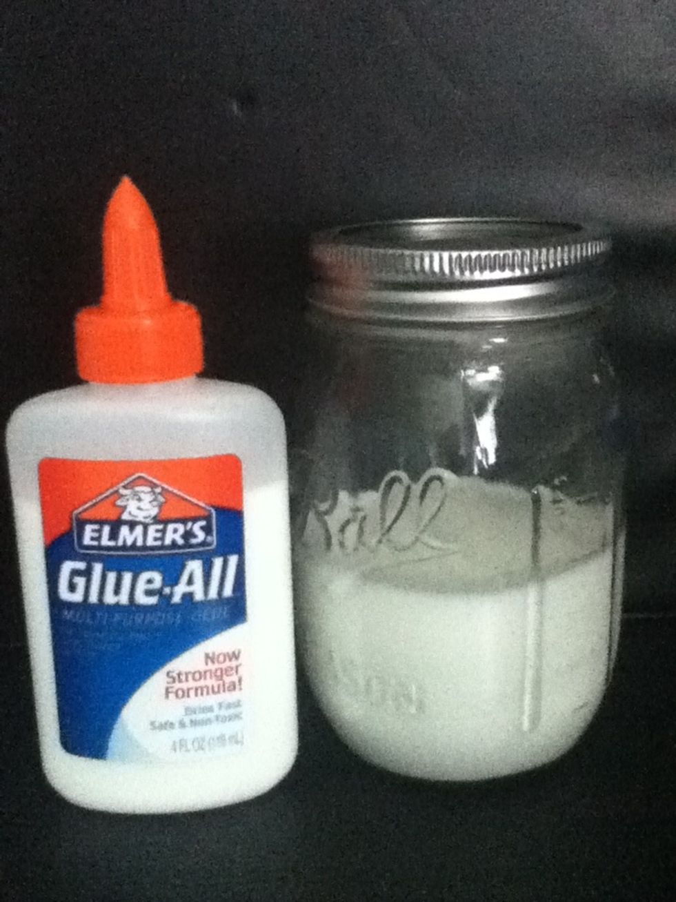 First, you need to make the sealer. This is basically a homemade Modge-Podge. Take your Mason jar and fill it with glue and water. About half each, but use a tad more glue then water.